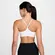 Top Nike Dri-FIT Indy Suporte Leve Feminino