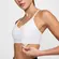 Top Nike Dri-FIT Indy Suporte Leve Feminino