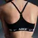Top Nike Dri-FIT Indy Suporte Leve Feminino