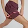 Short 2 em 1 New Balance Sport Essentials Feminino