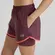 Short 2 em 1 New Balance Sport Essentials Feminino